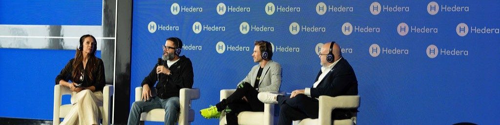 Joe Blanchard speaking on a panel at a Hedera event